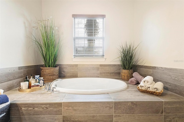 bathroom with a washtub