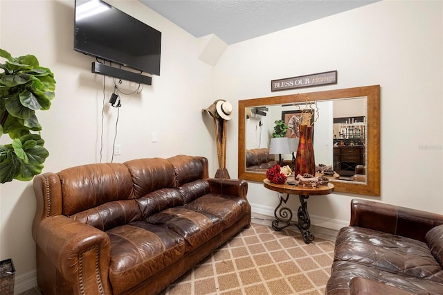 living room with a textured ceiling