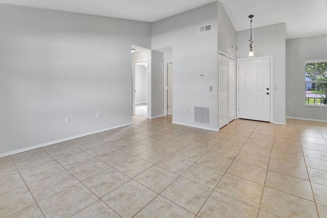 interior space with light tile patterned floors