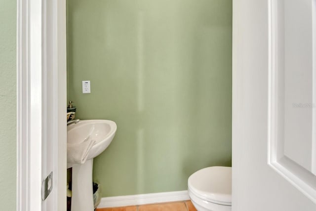 bathroom with sink and toilet