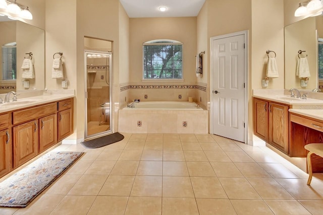 bathroom featuring tile floors and dual bowl vanity