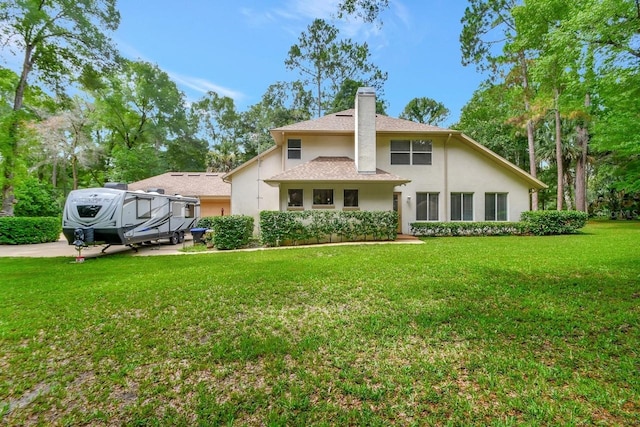 view of front of property with a front lawn