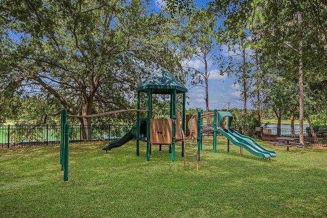 view of jungle gym featuring a yard