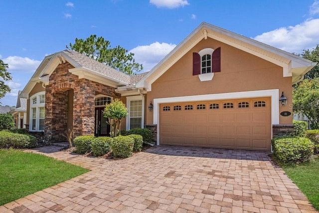 view of front of property with a garage