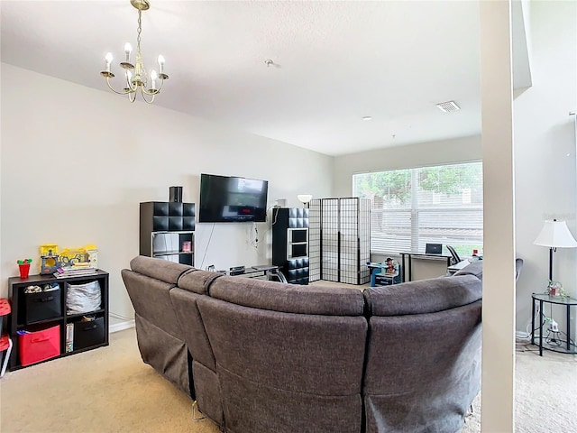 carpeted living room featuring an inviting chandelier