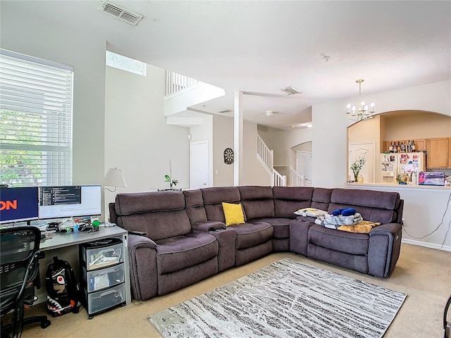 living room featuring a chandelier