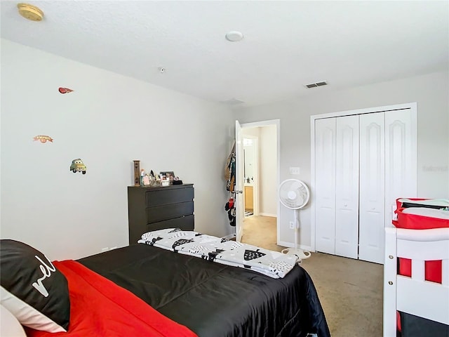 bedroom with carpet flooring and a closet