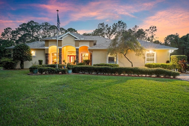 view of front facade with a lawn