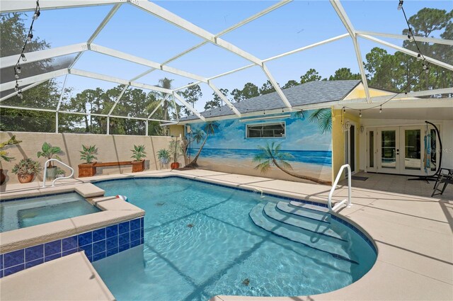 view of swimming pool featuring a lanai, a patio, and an in ground hot tub