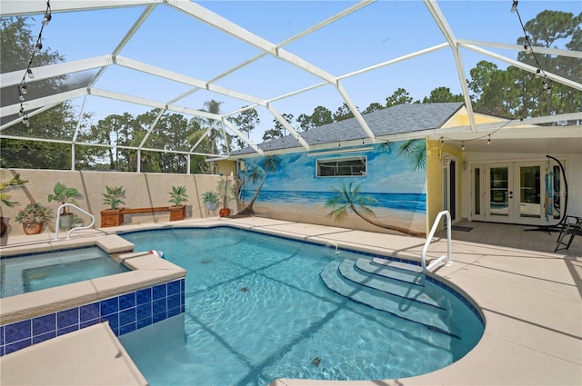 view of pool featuring a patio area, a pool with connected hot tub, glass enclosure, and french doors