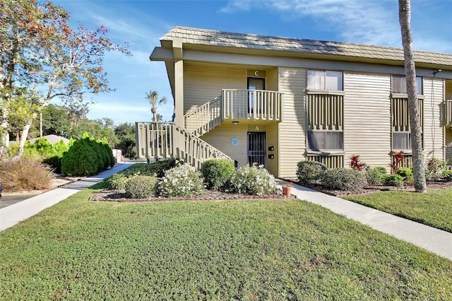 view of property featuring stairway