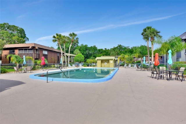 view of pool featuring a patio