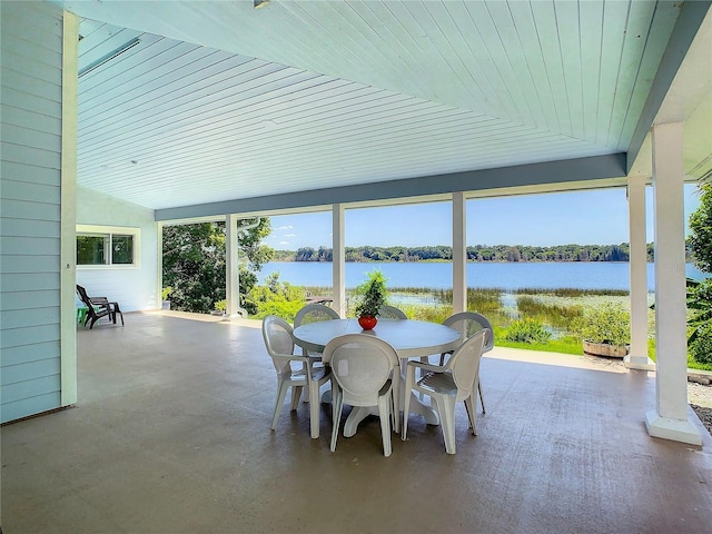 view of patio / terrace with a water view