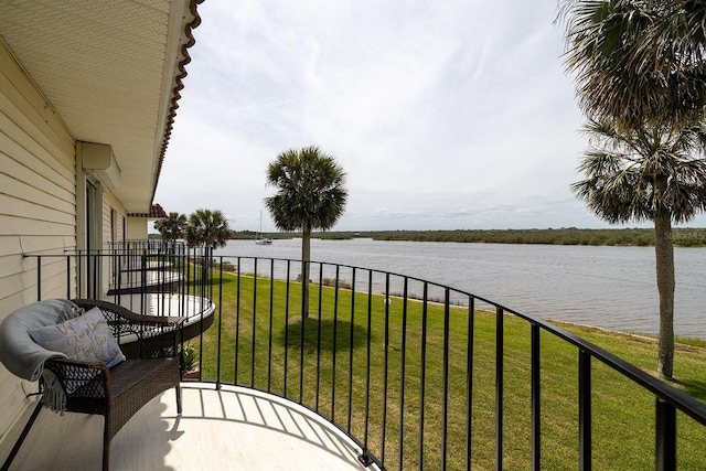 balcony featuring a water view