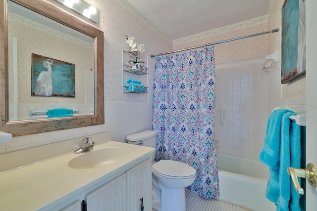 full bathroom with toilet, tile patterned flooring, vanity, tile walls, and shower / bathtub combination with curtain