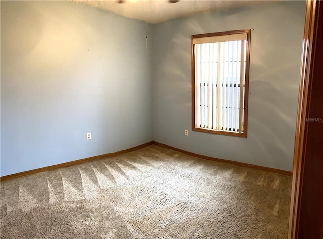 view of carpeted spare room