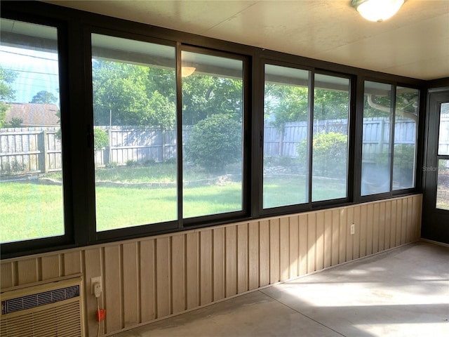 unfurnished sunroom with a healthy amount of sunlight