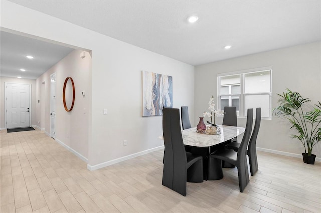 dining space featuring light hardwood / wood-style flooring