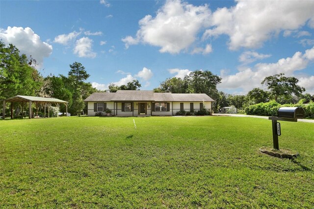 view of front facade with a front yard