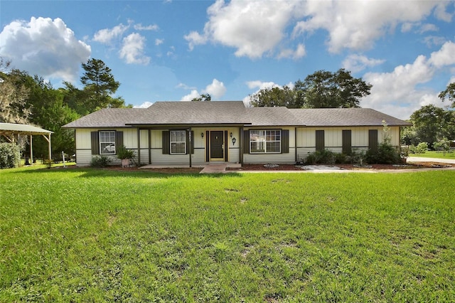 single story home featuring a front yard