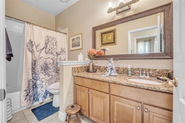 full bathroom featuring vanity, shower / tub combo with curtain, toilet, and tile patterned floors