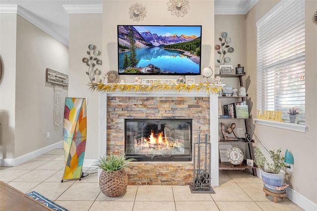 living room with a stone fireplace, crown molding, and tile patterned floors