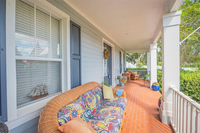 view of patio featuring covered porch