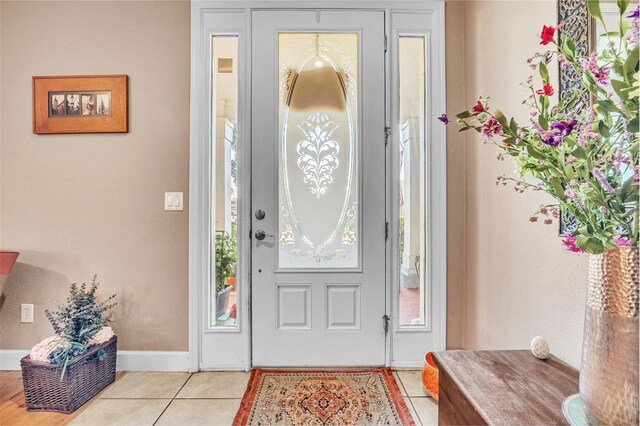 view of tiled foyer entrance