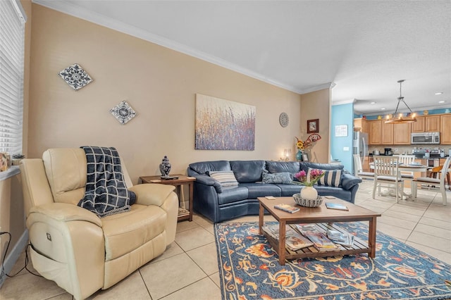 living room with crown molding, an inviting chandelier, and light tile patterned floors