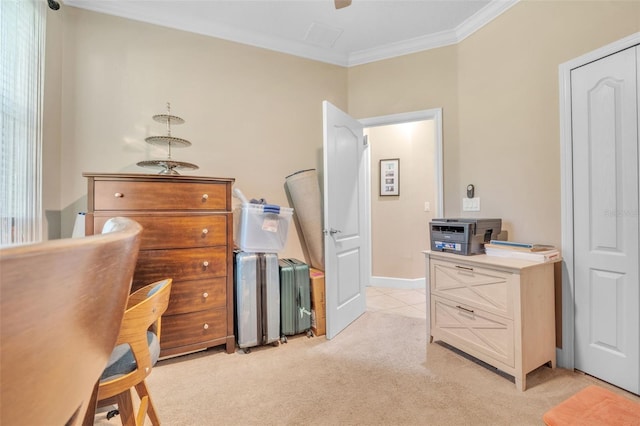 home office with ornamental molding and light colored carpet