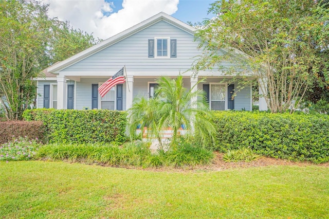 view of front of home with a front yard