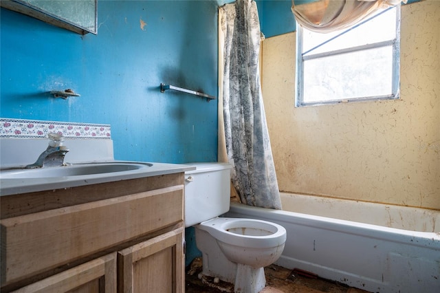 full bathroom featuring toilet, vanity, and shower / bath combination with curtain