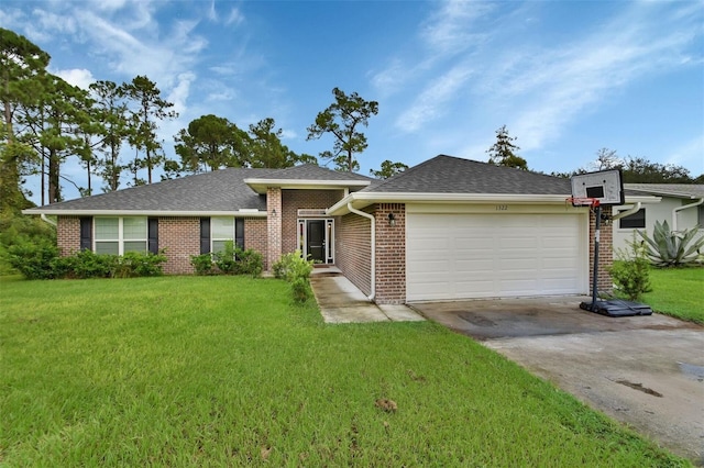 single story home featuring a garage and a front lawn