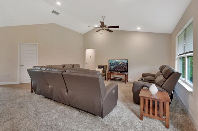 living room with light carpet, vaulted ceiling, and ceiling fan