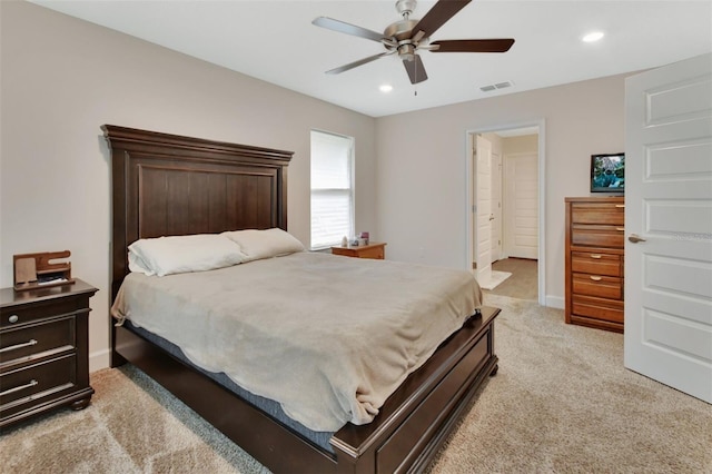 carpeted bedroom featuring ceiling fan