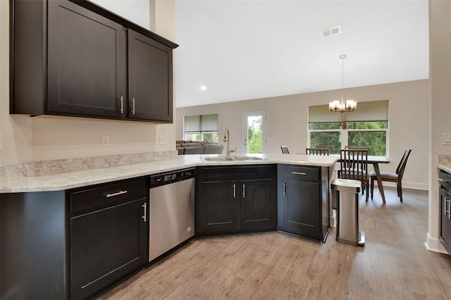 kitchen with a healthy amount of sunlight, dishwasher, sink, and light wood-type flooring