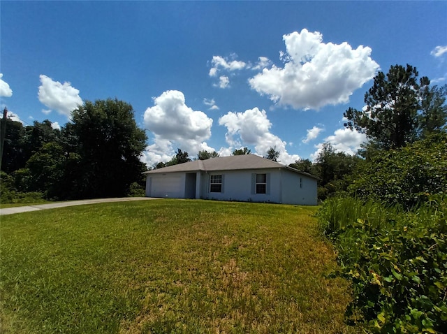 view of yard featuring a garage