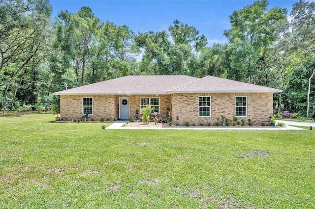 ranch-style house with a front yard