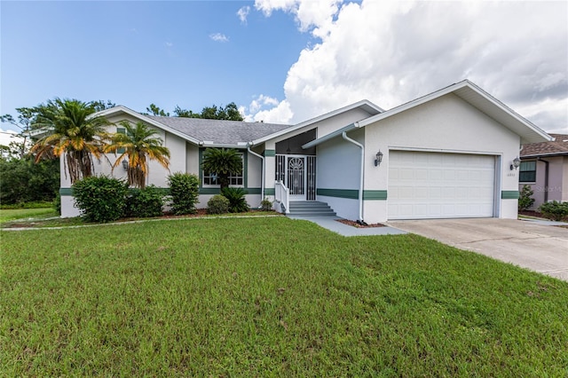 single story home featuring a garage and a front lawn