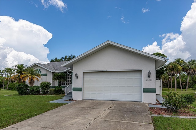 single story home featuring a garage and a front yard