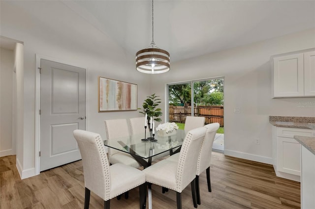 dining room with light hardwood / wood-style flooring