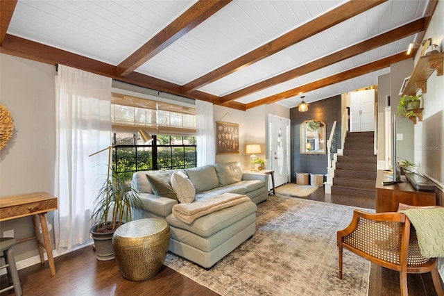 living room with lofted ceiling with beams and hardwood / wood-style floors