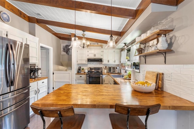 kitchen featuring appliances with stainless steel finishes, backsplash, beam ceiling, ventilation hood, and white cabinetry