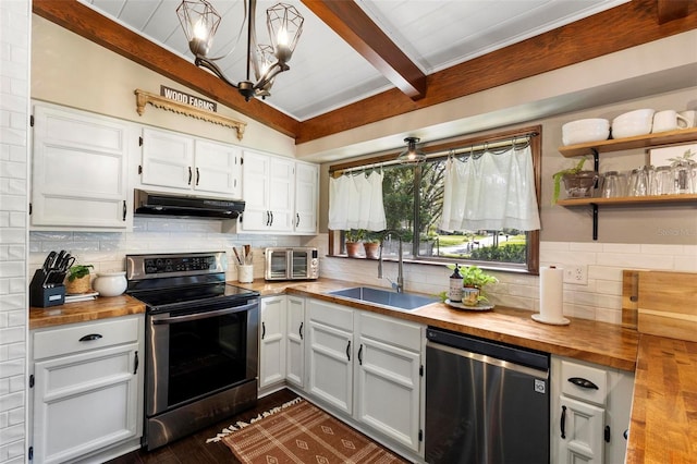 kitchen featuring dark hardwood / wood-style floors, stainless steel appliances, butcher block countertops, and ventilation hood