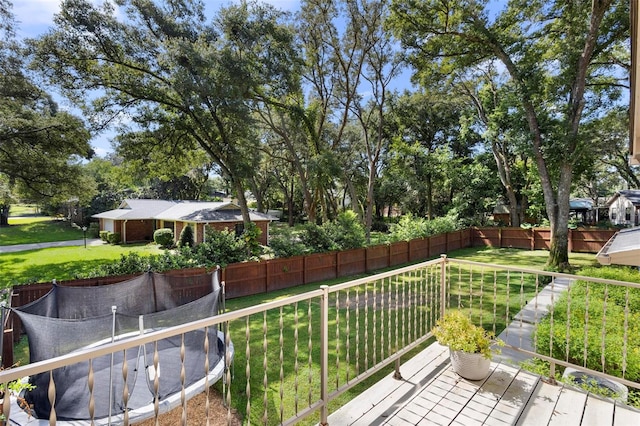 wooden balcony featuring a deck