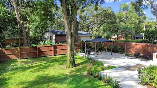 view of yard featuring a patio and a gazebo