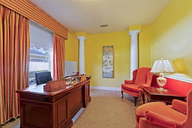 309 Chesham St, Ormond Beach, FL 32174 - home office with decorative columns, a textured ceiling, and baseboards
