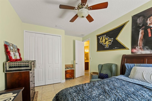 309 Chesham St, Ormond Beach, FL 32174 - bedroom with light tile patterned flooring, a closet, and ceiling fan