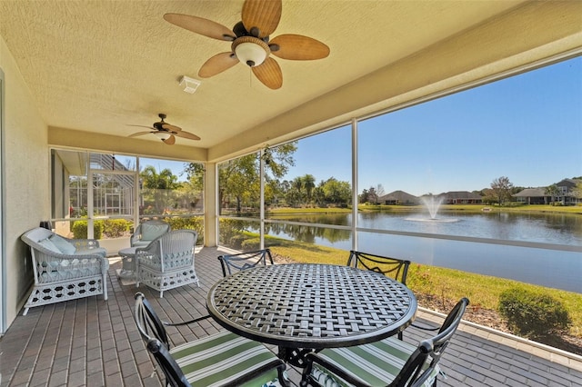 309 Chesham St, Ormond Beach, FL 32174 - sunroom with a water view, ceiling fan, and outdoor dining area