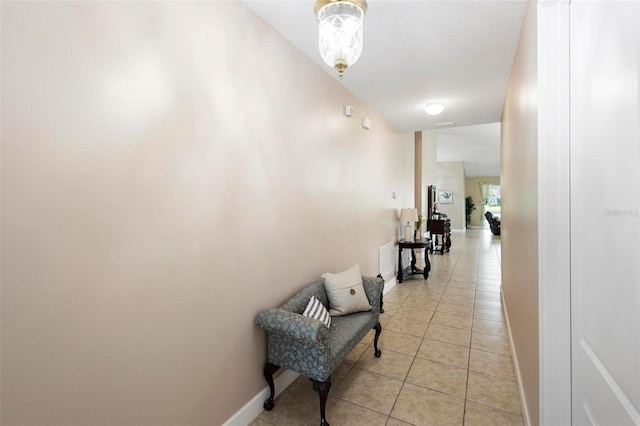 309 Chesham St, Ormond Beach, FL 32174 - hall with light tile patterned floors and baseboards